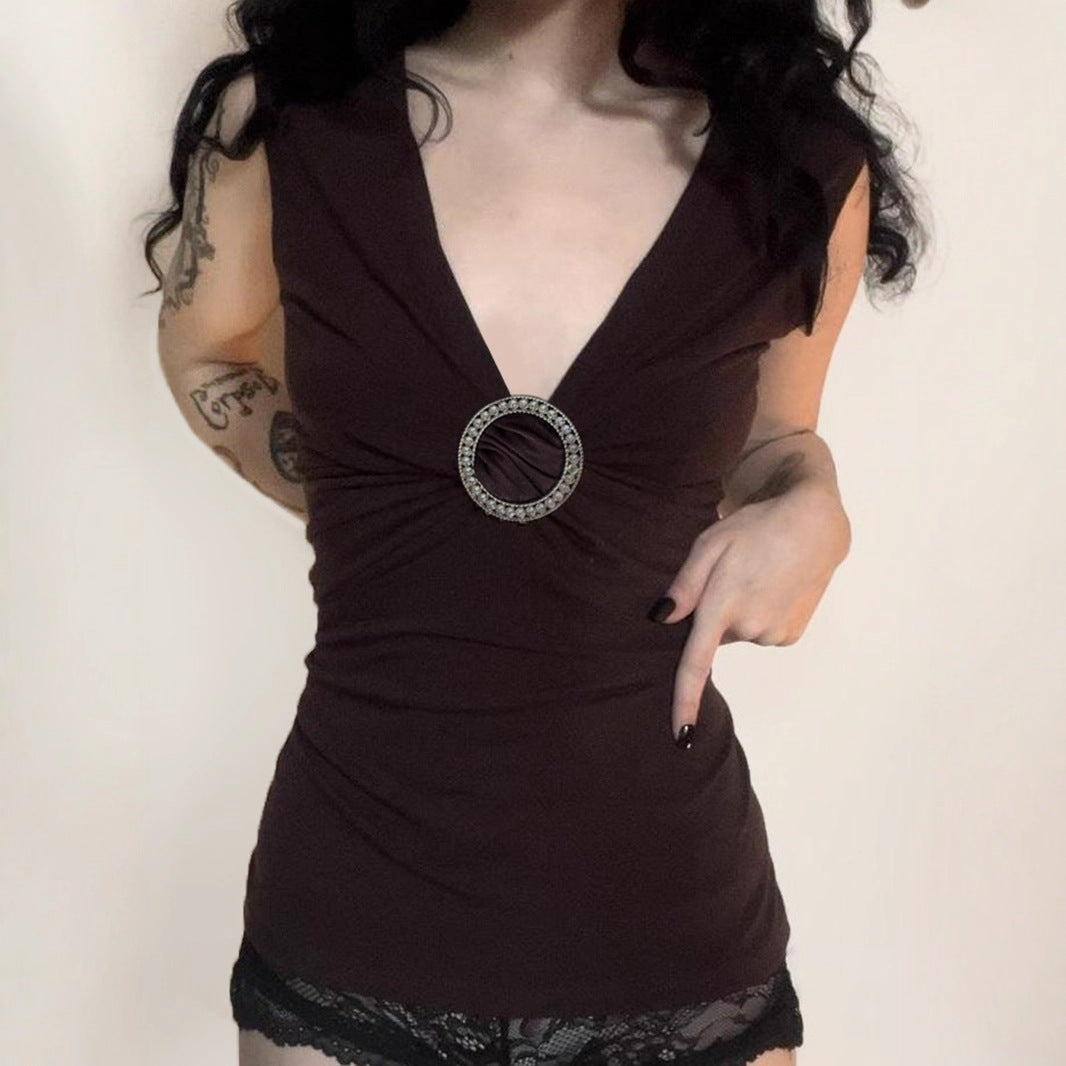 Mature and sophisticated deep V-neck vest with rhinestone ring embellishments