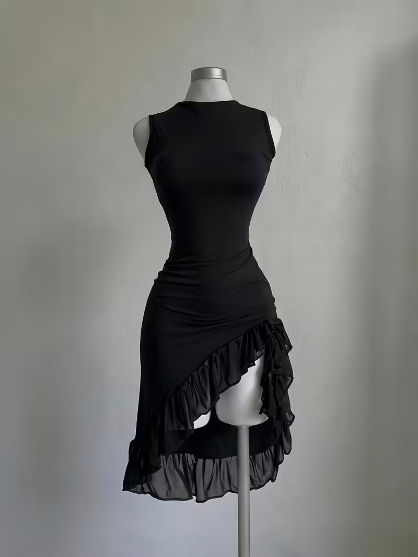 An Asymmetrical Dress With Flounces