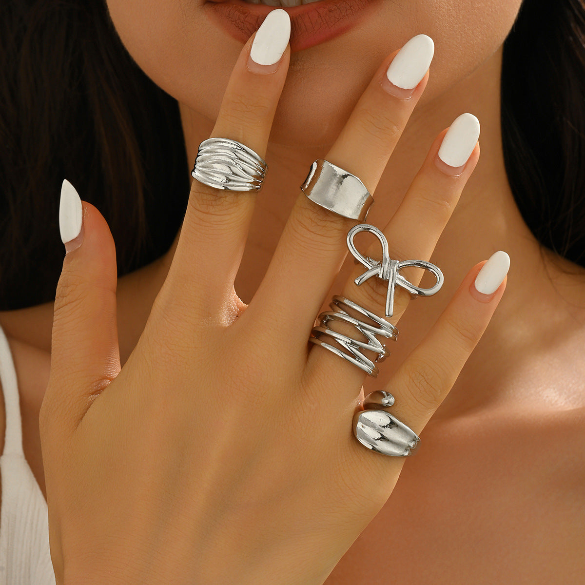 Irregular Metal Niche Lava Ring With Smooth, Polished Lines And An Open Design